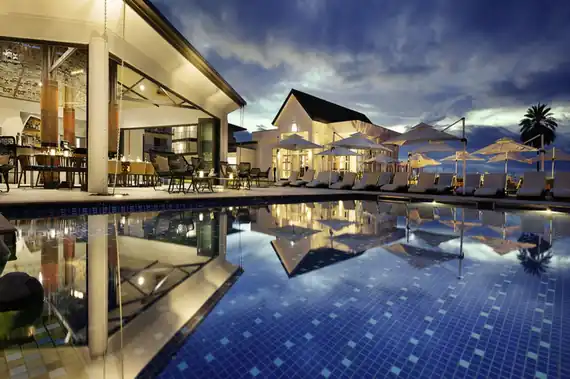 Pool and palm view at Xarvella